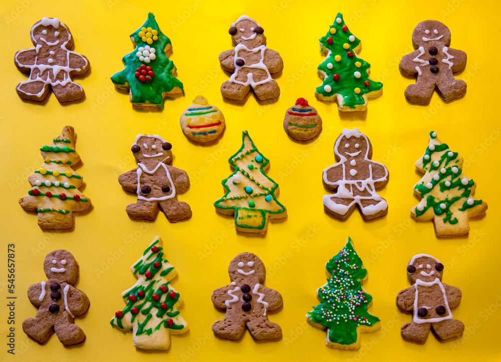 Gingerbread cookies on the golden background Gingerbread cookies on the golden background