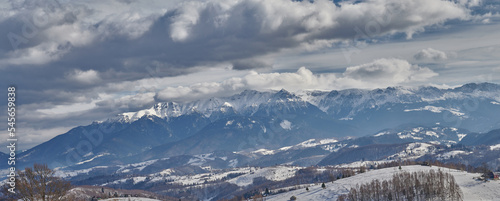 Panoramic view over the ountains valley in winter photo