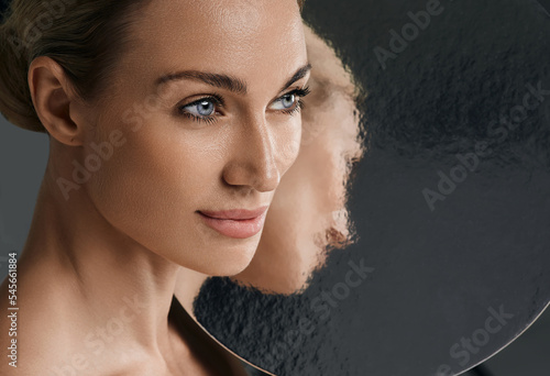 Beauty portrait of woman with perfect and shiny skin. Concept of skin care and aesthetic cosmetology, high quality