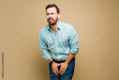 Portrait of an ill man with urinary incontinence photo
