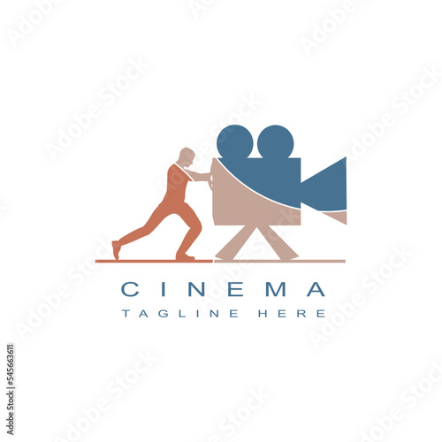 Businessman pushing retro camera. Movie production logo design photo
