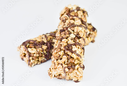 Two cereal fitness bars on a white background.Close-up .