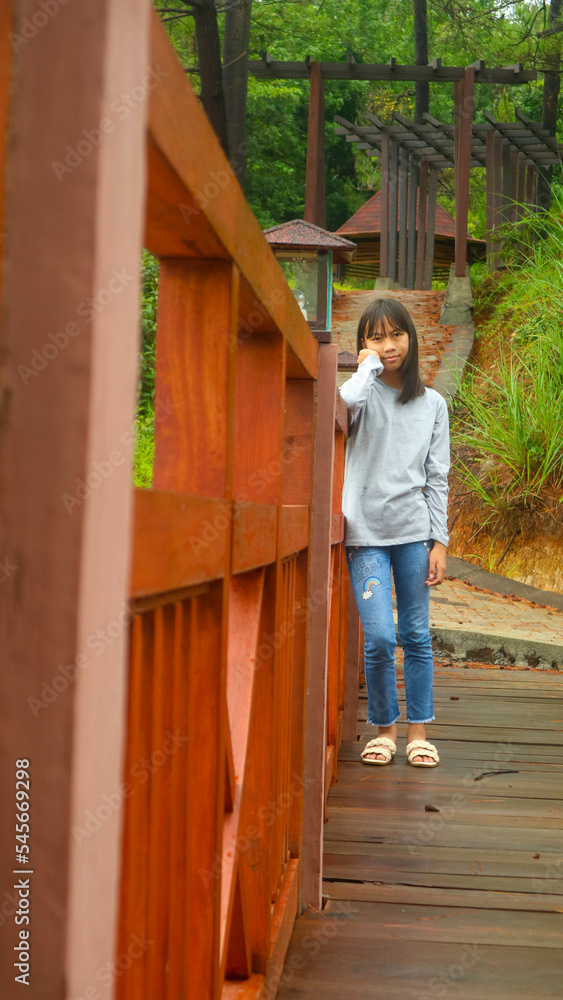 a little girl at a tourist place