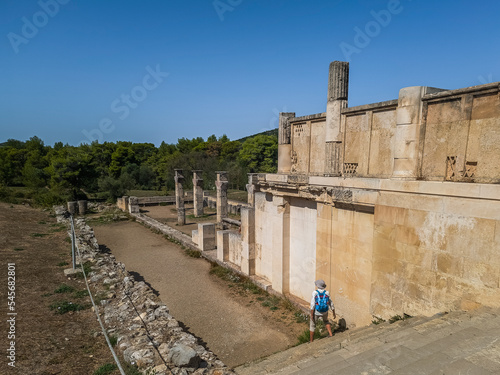 Tourist Exploring Ruins of the Abaton in Epidaurus photo