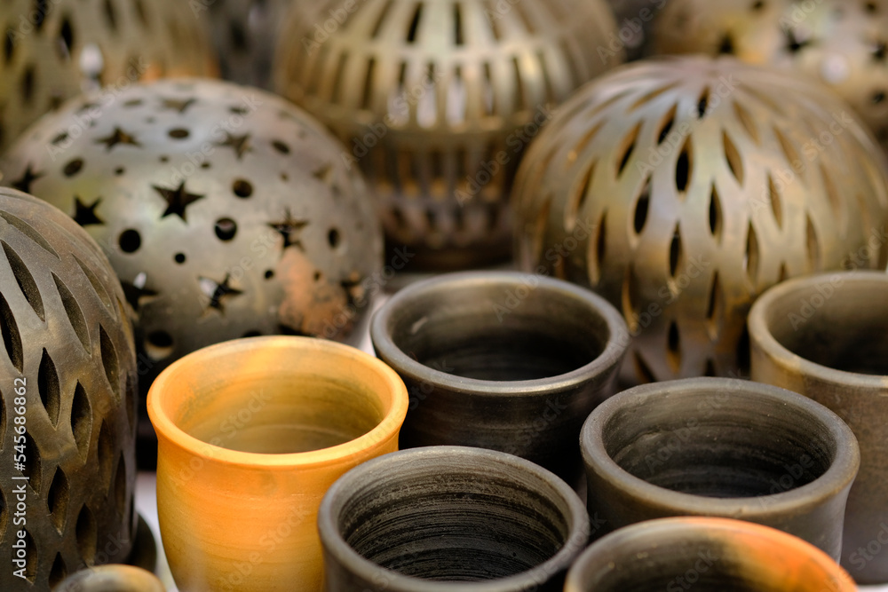 Fototapeta premium Hand made colorful ceramic pottery. Hand painted pottery. Traditional pottery fair in Pune, India.
