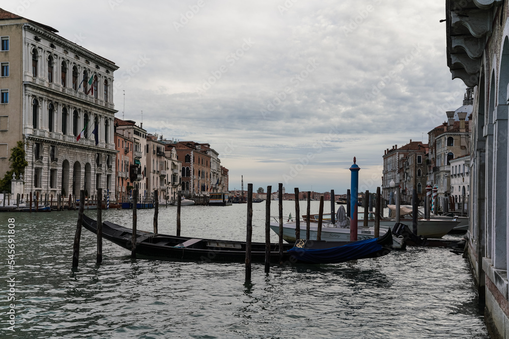 gondolas docked along the grand canal in Venice, Italy