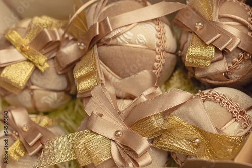 Hand made gold Christmas balls. Close-up © яна винникова