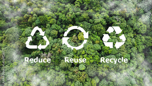 Reduce, reuse, recycle symbol in the middle of a beautiful untouched jungle. Ecological concept. An ecological metaphor for ecological waste management and a sustainable and economical lifestyle. photo