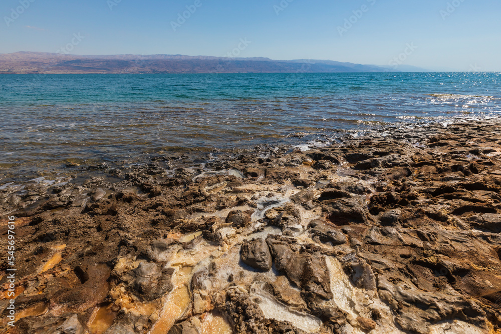 Mud and layers of salt on the coast of the Dead Sea in Israel Mud and layers of salt on the coast of the Dead Sea in Israel