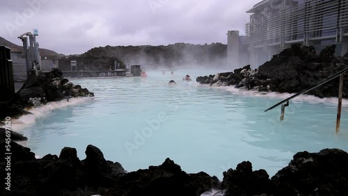 people swimming blue lagoon iceland in geo thermals