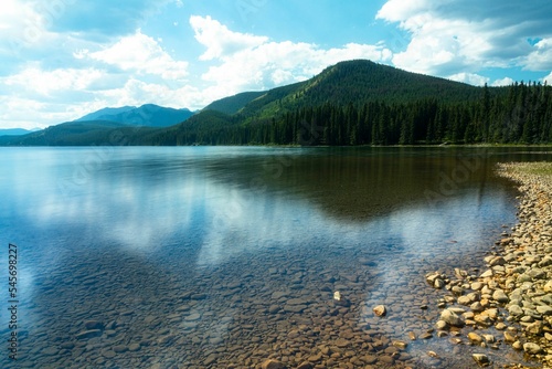 Fototapeta Naklejka Na Ścianę i Meble -  Calm and clear Rock Lake in Yellowhead County, Alberta, Canada