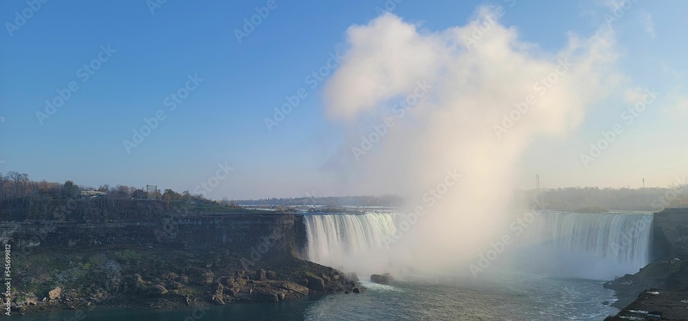 Panoramic view of mist over Niagara Falls, Ontario, Canada on a sunny day
