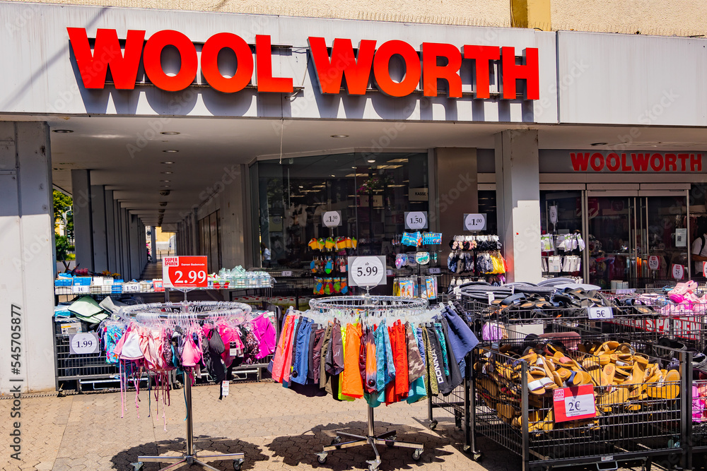 Neuwied, Germany - July 09, 2022: entrance of the local Woolworth store  with hatracks in front Stock Photo | Adobe Stock