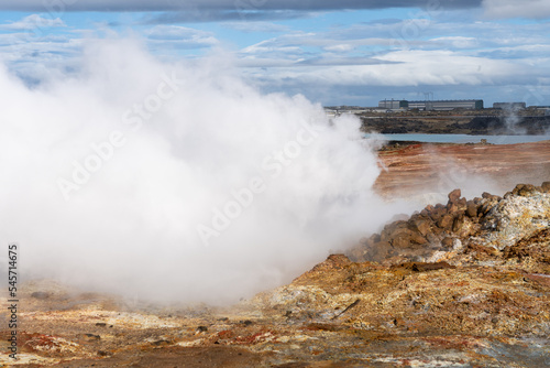 Gunnuhver hot springs at Reykjanes peninsula, Iceland. Popular tourist destination, geothermal power plant in background