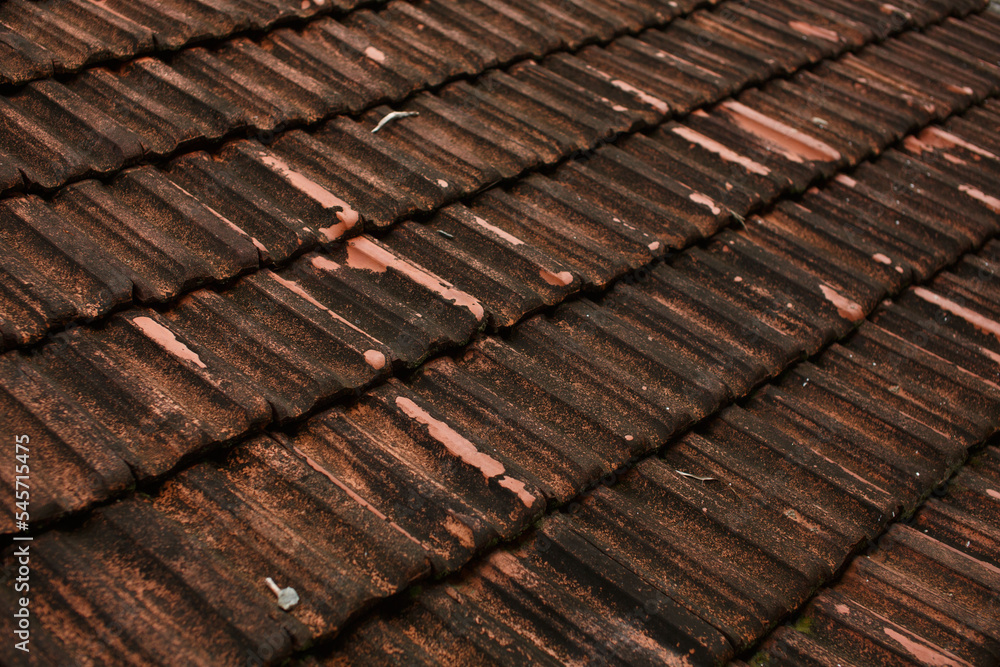 Background of red tiled roof. Red old roof tiles Background of red tiled roof. Red old roof tiles