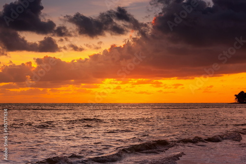 Beautiful red sunrise at sea. Dawn on the Atlantic ocean. The su