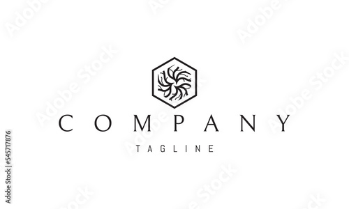 Vector logo on which an abstract image of a pattern of tree roots in the form of a hexagon.