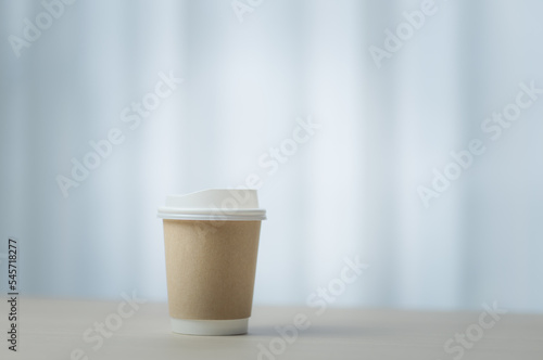 Paper cup of takeaway coffee