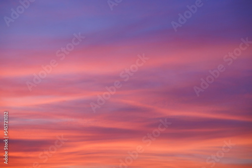 strange and smooth cloud with pink and purple sky background. © Rattanachat