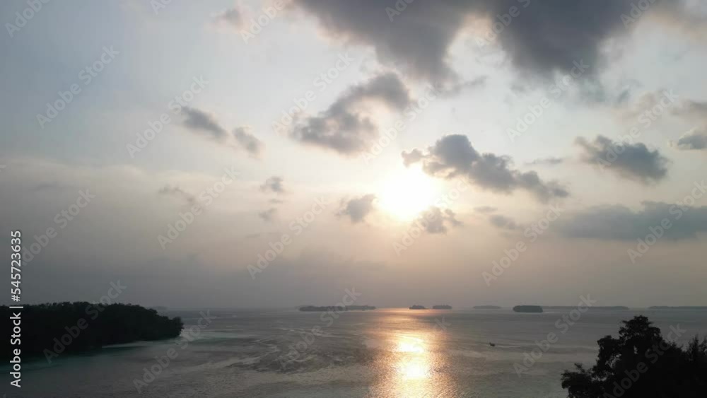Scenic view of the Golden Hour at Papateo Island in North Jakarta, Indonesia Scenic view of the Golden Hour at Papateo Island in North Jakarta, Indonesia