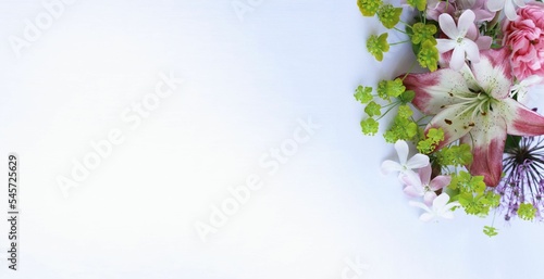 Bouquet with pink lilies on a white background. Delicate floral arrangement. Background for a greeting card.
