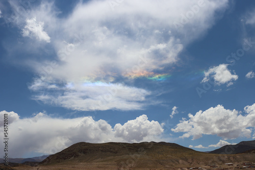 Reflection of light in the clouds forms a rainbow © Fabideciria