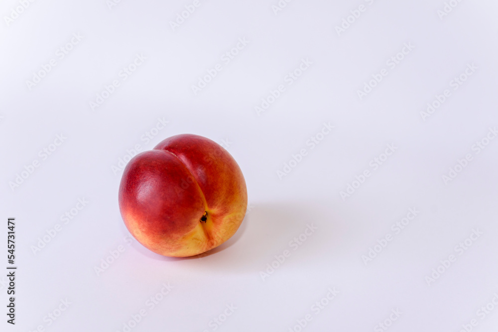 Large ripe peach isolated on white background. Useful fruit close-up Large ripe peach isolated on white background. Useful fruit close-up