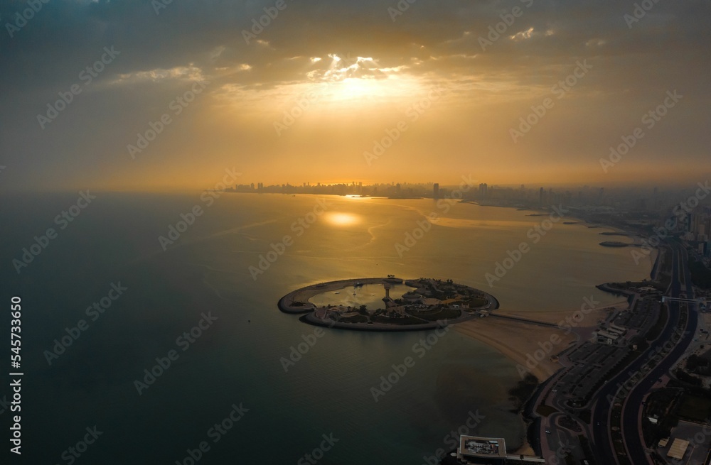 Naklejka premium Aerial view of an island in Kuwait at sunset