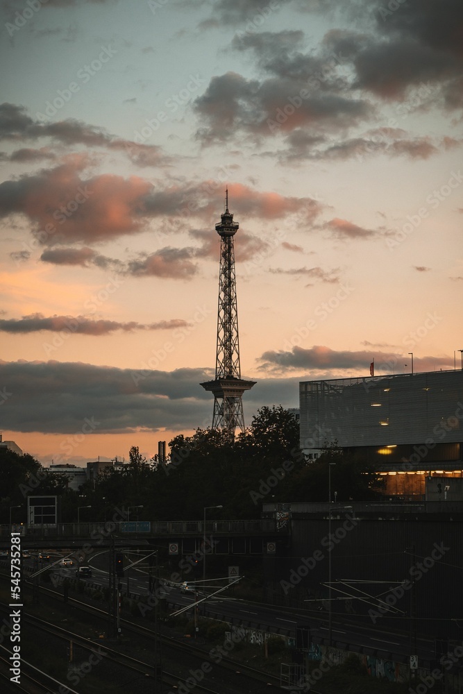 Naklejka premium Vertical shot of Funkturm in Berlin, Germany at sunset
