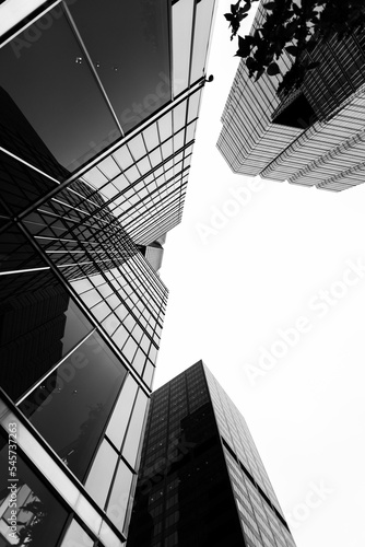 Canvas Print Grayscale low angle shot of office buildings in downtown Toronto emphasizing arc