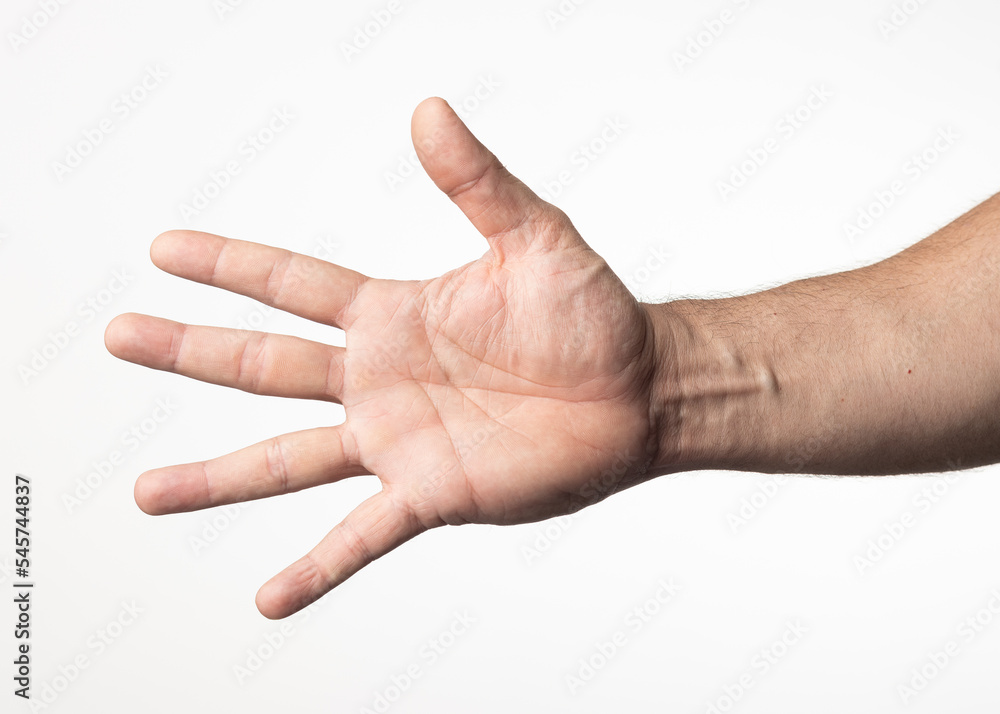 A man's hand and arm on a nuclear white background, showing a gesture of quantity with his fingers. A man's hand and arm on a nuclear white background, showing a gesture of quantity with his fingers.