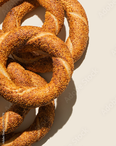 Turkish simit (bagel) closeup on beige background photo