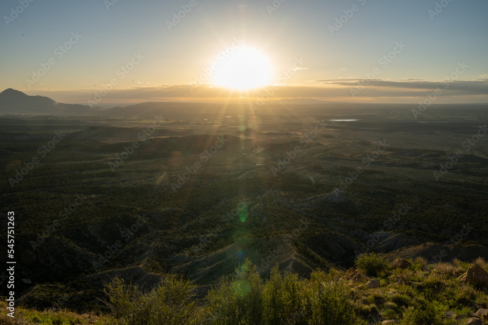 Sun Setting Over Valley Below Mesa Verde