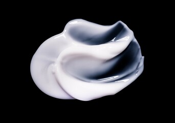 Cosmetic balm cream texture isolated on black