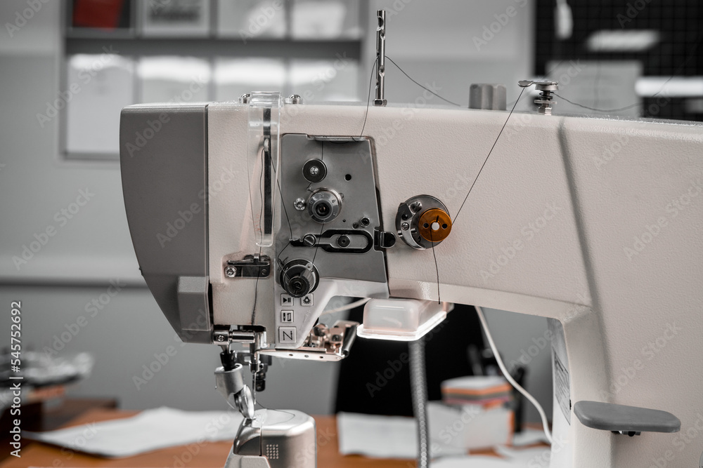 industrial sewing machines at the enterprise close-up