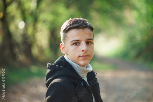 portrait of handsome young man outdoors