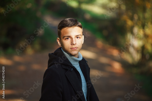 portrait of handsome young man outdoors