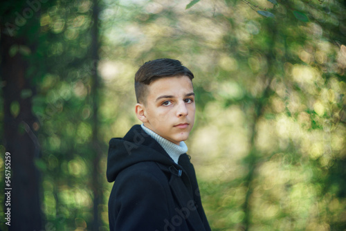 portrait of handsome young man outdoors