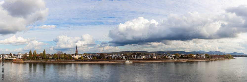 Bonn, North-Rhein Westfalia, Germany - November 5, 2022: Cityscape and riverside of Rhein river in Bonn, Germany. Autumn promenade on a cloudy day