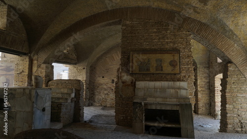 Photography Ostia Antica, Rome, Italy - July 02, 2022, interior of the Thermopolium block in Via di Diana