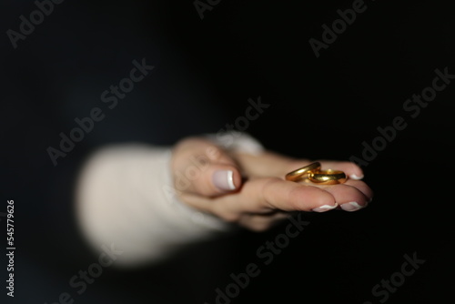 wedding rings on hand - gold rings