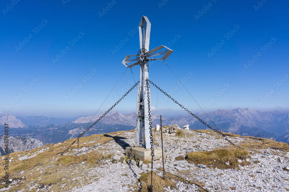 The summit cross on the Hochturm mountain on a stunning day with blue sky