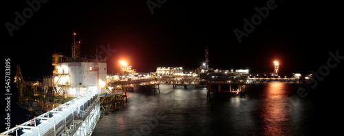 Offshore oil rig at night