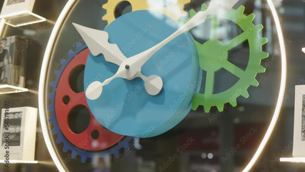 watch mechanism moving hands colored gears and cogs. artificial clock