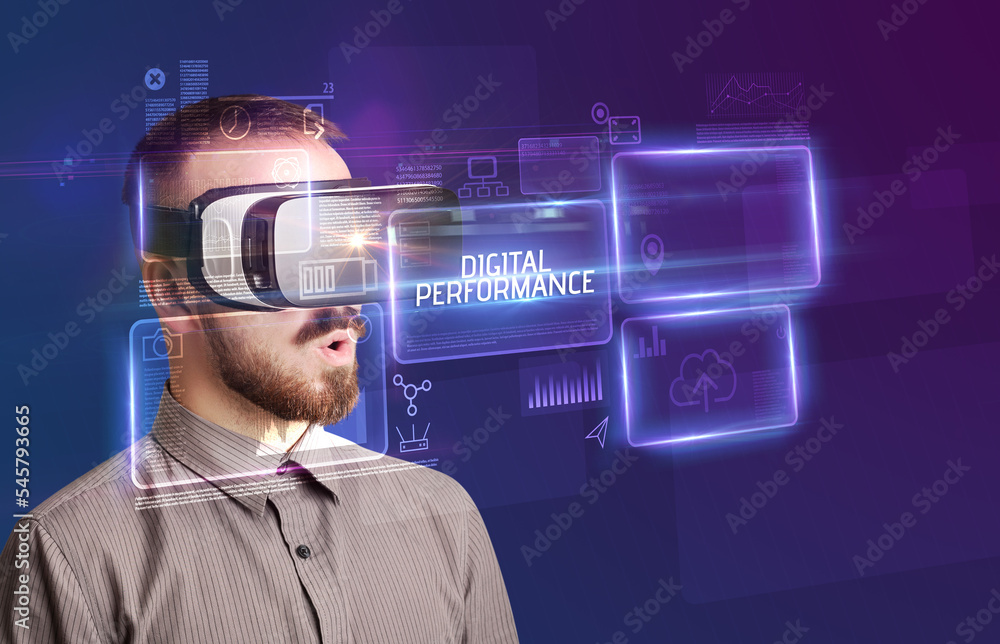 Businessman looking through Virtual Reality glasses, tech concept Businessman looking through Virtual Reality glasses, tech concept