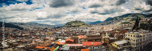 panoramic aerial view of quito ecuador capital with andes mountains  photo