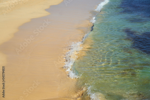 Waves with foam on the Atlantic coast in Cape Verde.