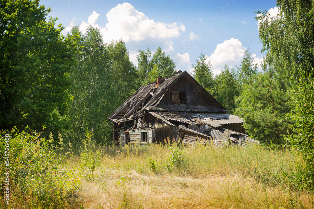 Landscape with an abandoned wooden house, desolation and ruin Landscape with an abandoned wooden house, desolation and ruin