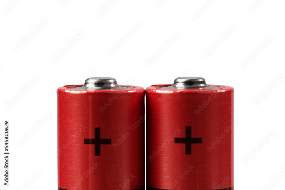 rechargeable batteries in a red shell, positive contact, isolated on a white background rechargeable batteries in a red shell, positive contact, isolated on a white background