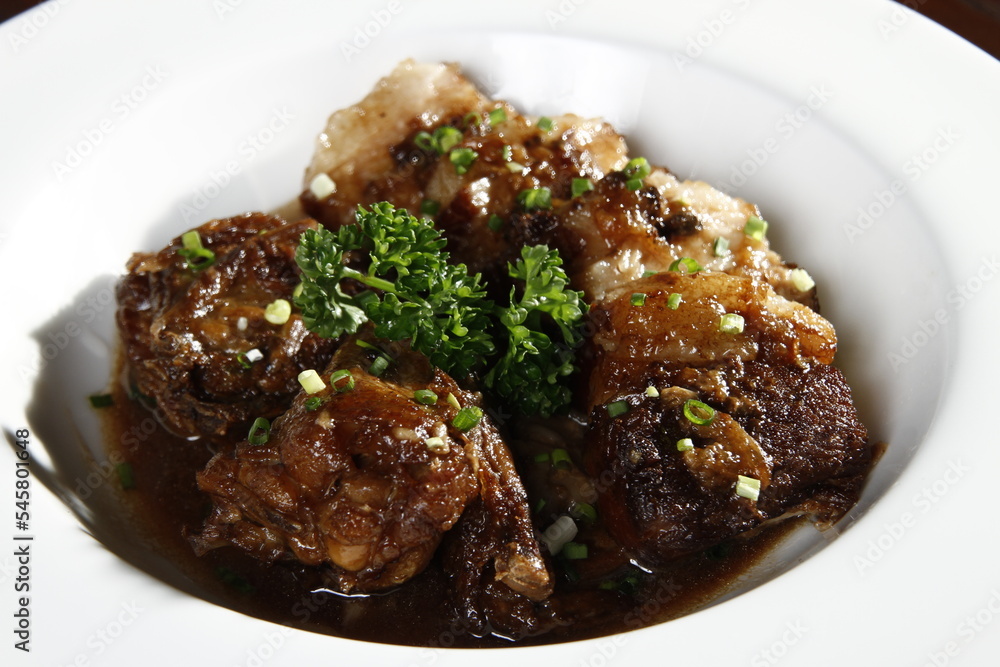 Chicken and pork adobo - Filipino dish Chicken and pork adobo - Filipino dish